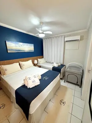 Uma cama ou camas num quarto em Apartamento Casa Praiana - 200m do mar, com vista