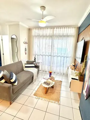 Uma área de estar em Apartamento Casa Praiana - 200m do mar, com vista