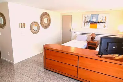 Uma cama ou camas num quarto em Flat no melhor da Beira-mar de Fortaleza