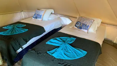 Uma cama ou camas num quarto em Guajiru kite-safari