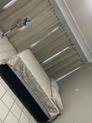 Uma cama ou camas num quarto em apartamento mobiliado praia do futuro 200m da praia