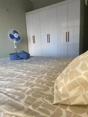 Uma cama ou camas num quarto em apartamento mobiliado praia do futuro 200m da praia