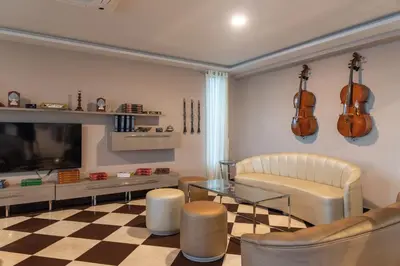 Uma televisão e/ou sistema de entretenimento em Vila Galé Collection Sunset Cumbuco