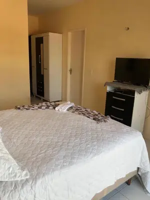 Uma cama ou camas num quarto em Cris hospedagem