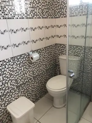 Uma casa de banho em Cris hospedagem