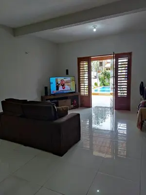 Uma televisão e/ou sistema de entretenimento em Casa Atlantico Flecheiras