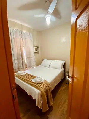 Uma cama ou camas num quarto em Apartamento Charme Guará 2 - Centrinho de Guaramiranga