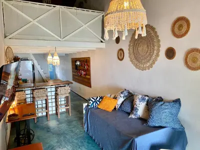 Uma área de estar em La Moni- Casa frente ao Mar-Sea View