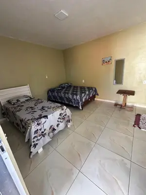 Uma área de estar em Pousada Vó Maria