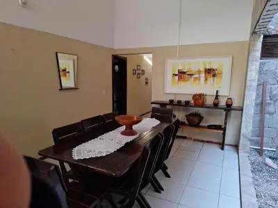 Uma área de estar em Mar Azul Casa de Praia