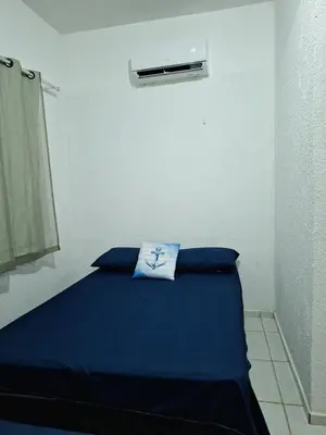 Uma cama ou camas num quarto em Mar Azul Casa de Praia