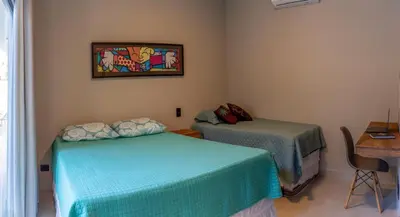 Uma cama ou camas num quarto em Casa Lorenzo Preá Beach