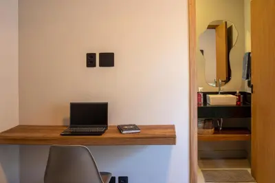 Uma televisão e/ou sistema de entretenimento em Casa Lorenzo Preá Beach
