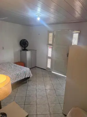 Uma cama ou camas num quarto em Apartamento mobiliado