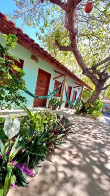 Um jardim no exterior de Recanto do cajueiro