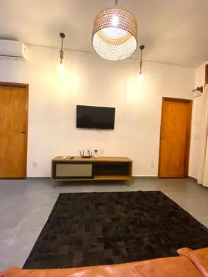 Uma televisão e/ou sistema de entretenimento em Casa Elementus Preá
