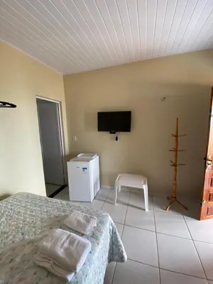 Uma televisão e/ou sistema de entretenimento em Chico Caranguejo da Baleia