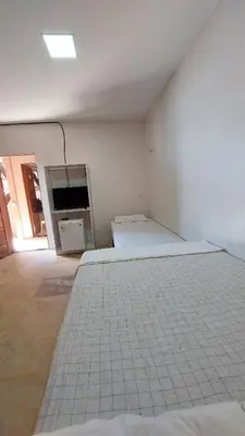 Uma cama ou camas num quarto em Chico Caranguejo da Baleia