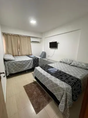 Uma cama ou camas num quarto em Beach Place Cumbuco Apto 106