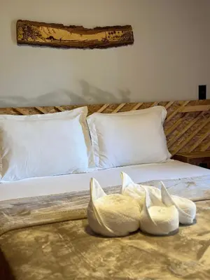 Uma cama ou camas num quarto em Windland Pousada Kite Center