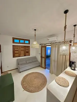 Uma área de estar em Flats Elementus Preá