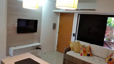 Uma televisão e/ou sistema de entretenimento em Ap Studio 230 Eco Paradise