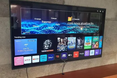 Uma televisão e/ou sistema de entretenimento em 1st Beachfront Deluxe Apartment B102 in Dream Beach Cumbuco