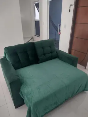 Uma área de estar em Condomínio Azure Residence