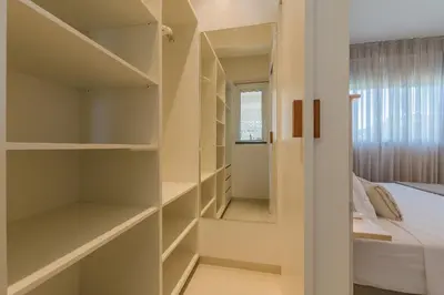 Uma cama ou camas num quarto em Kite Star - Apartamentos no Melhor do Cumbuco por Carpediem