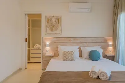 Uma cama ou camas num quarto em Kite Star - Exclusividade por Carpediem
