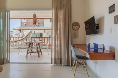 Uma televisão e/ou sistema de entretenimento em Kite Star - Apartamento duplo por Carpediem