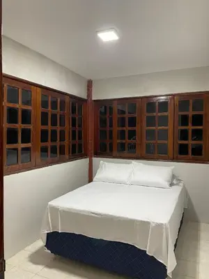 Uma cama ou camas num quarto em Encantu`s da Serra