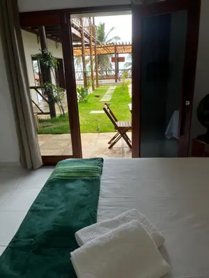 Uma cama ou camas num quarto em Pousada Quinta do Mar