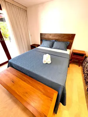 Uma cama ou camas num quarto em CASA TAÍBA BEACH RESORT PÉ Na AREIA - IMOB TEMPORADA