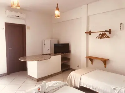 Uma cama ou camas num quarto em Casa Mar Suites