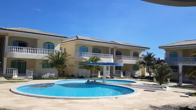 A piscina em ou perto de Apartamento 150m da praia de Canoa Quebrada