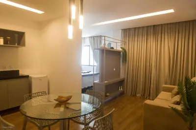 Uma área de estar em Flat Moderno e Elegante na Beira Mar de Fortaleza