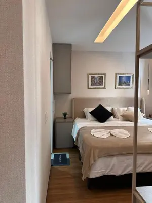Uma cama ou camas num quarto em Flat Moderno e Elegante na Beira Mar de Fortaleza