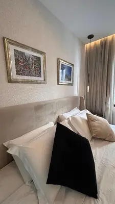 Uma cama ou camas num quarto em Flat Moderno e Elegante na Beira Mar de Fortaleza