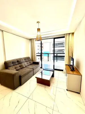 Uma área de estar em Flat Atlântico 405
