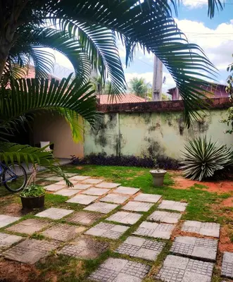 Um jardim no exterior de Apartamento kite surfe Cumbuco Tabuba
