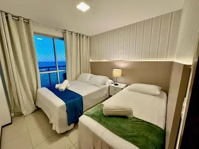 Uma cama ou camas num quarto em Terraços do Atlântico - Beira mar de Iracema