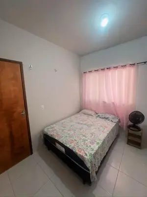 Uma cama ou camas num quarto em Casa de Praia Paracuru