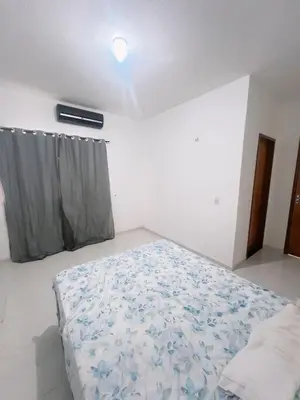 Uma cama ou camas num quarto em Casa de Praia Paracuru