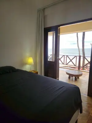 Uma cama ou camas num quarto em Cumbuco Penthouse - Som do Mar - Pé Na Areia - Ocean View - Ar Condicionado, perto do centro, 2 dormitórios, piscina, cozinha