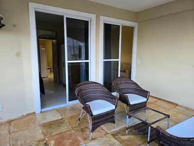 Uma área de estar em Cumbuco Residence - Beira-mar - Ar condicionado, perto do centro, 2 dormitórios, piscina, cozinha