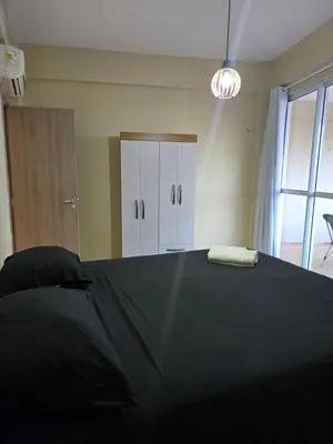 Uma cama ou camas num quarto em Cumbuco Residence - Beira-mar - Ar condicionado, perto do centro, 2 dormitórios, piscina, cozinha