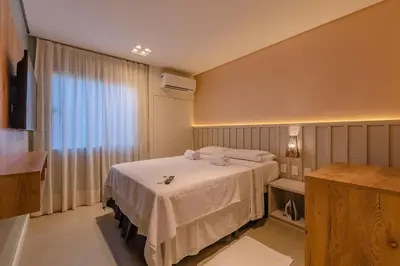 Uma cama ou camas num quarto em Crystal Park #206 - Quádruplo por Carpediem