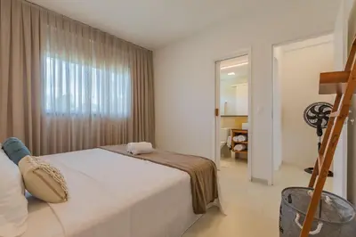 Uma cama ou camas num quarto em Kite Star - Duplo elegante por Carpediem