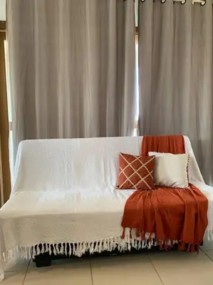 Uma cama ou camas num quarto em Flat Marezzi - Pé na areia - Taíba CE